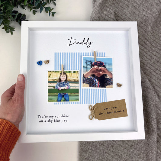 Personalised Man City Daddy photo frame gift for Father’s Day, with pale blue design, scrabble-style DADDY tiles, message “You’re my sunshine on a sky blue day,” and kraft tag. Perfect keepsake from baby or child to Manchester City fan dad. Upload photos at checkout.