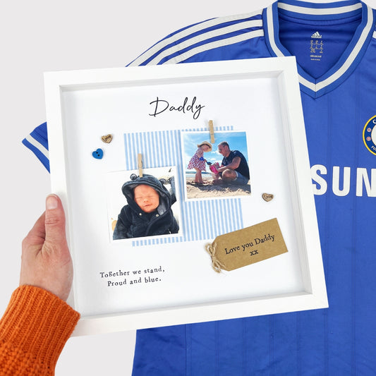 Chelsea Daddy photo frame gift for Father’s Day, with pale blue striped design, message “Together we stand, Proud and blue,” scrabble-style DADDY tiles, and kraft tag. Personalised keepsake for Chelsea FC fan dads. Upload two photos at checkout.