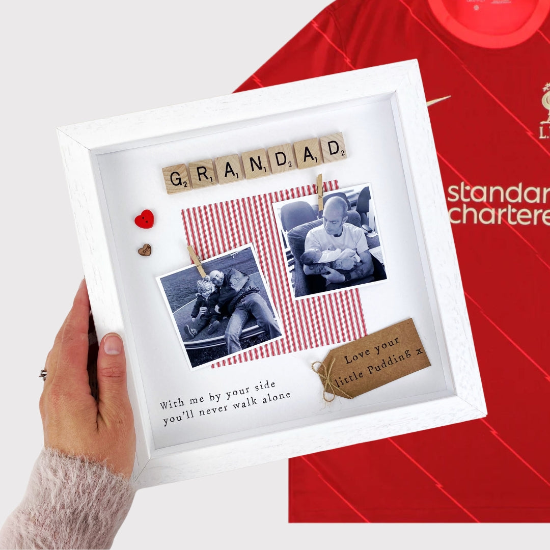 Personalised Liverpool Grandad photo frame gift for Father’s Day, featuring red striped design, message “You’ll never walk alone, Grandad,” scrabble-style GRANDAD tiles, and space for two uploaded photos. Handmade keepsake for Liverpool football fan grandads.