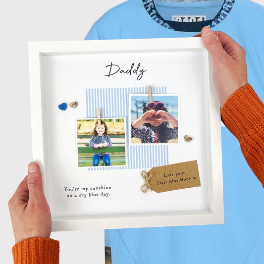 Personalised Man City Daddy photo frame gift for Father’s Day, with pale blue design, scrabble-style DADDY tiles, message “You’re my sunshine on a sky blue day,” and kraft tag. Perfect keepsake from baby or child to Manchester City fan dad. Upload photos at checkout.