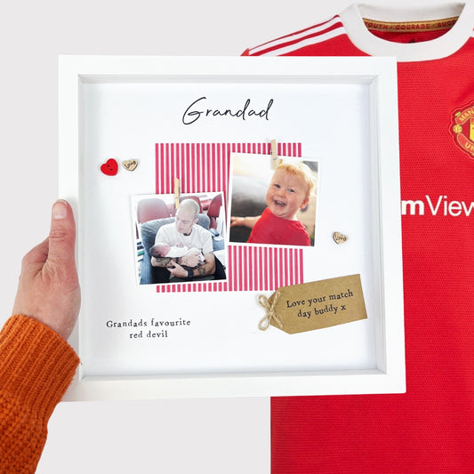 Personalised Man United Grandad photo frame for Father’s Day, featuring red and white design, two photo slots, scrabble-style GRANDAD tiles, and message “Grandads favourite red devil.” Ideal keepsake from grandchild for Manchester United fan. Upload your photos at checkout.