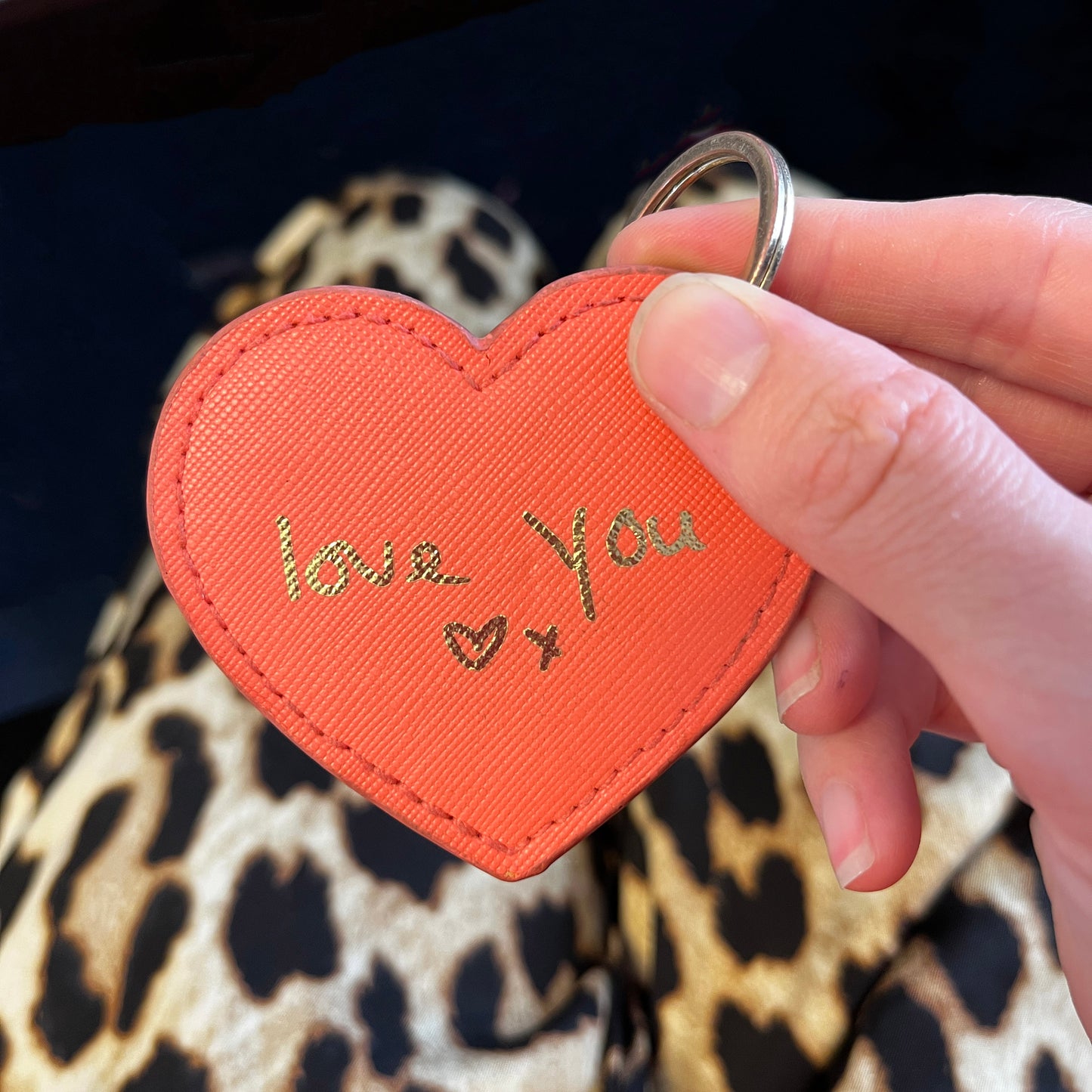 Heart-shaped keychain with 'love you' personalised handwriting