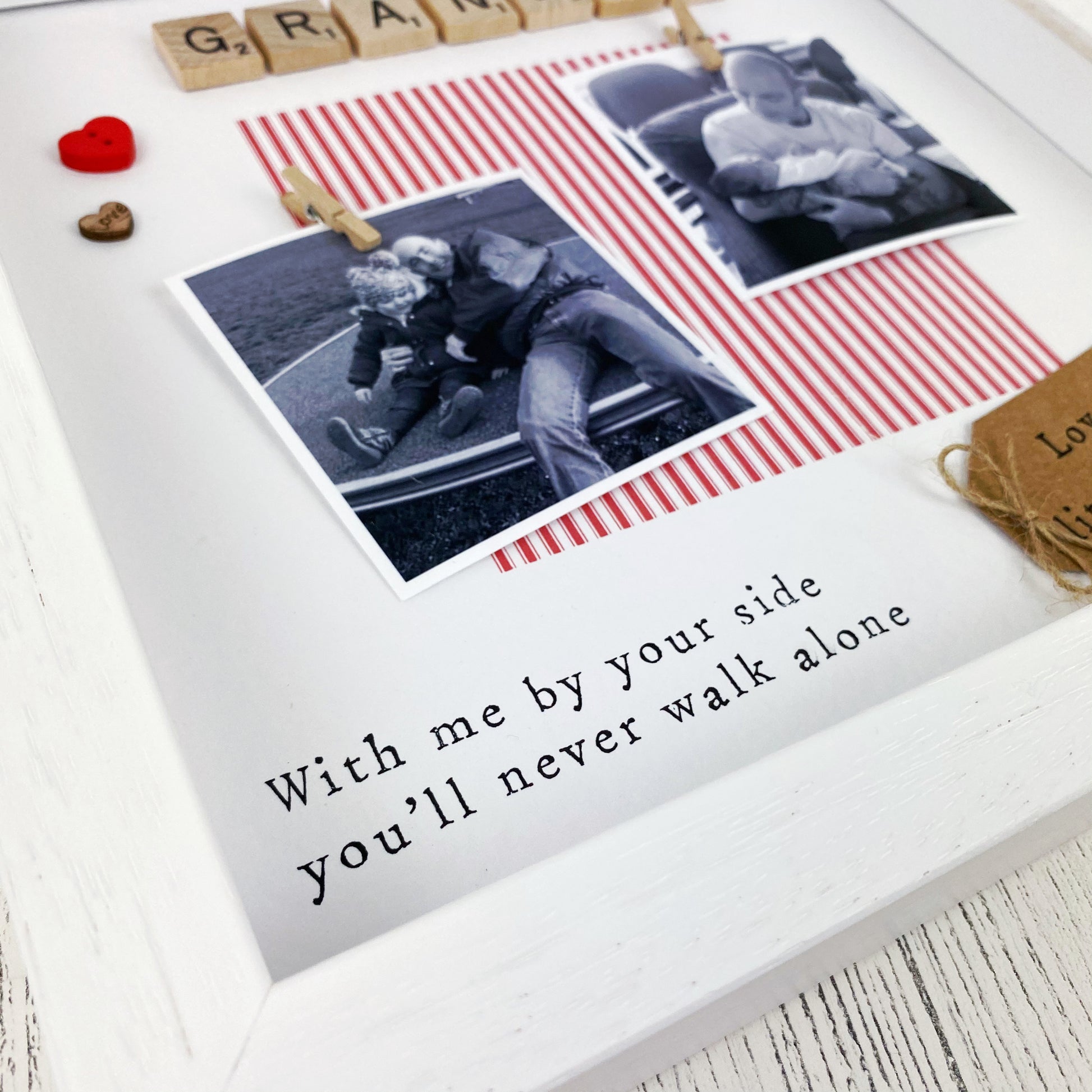 Personalised Liverpool Grandad photo frame gift for Father’s Day, featuring red striped design, message “You’ll never walk alone, Grandad,” scrabble-style GRANDAD tiles, and space for two uploaded photos. Handmade keepsake for Liverpool football fan grandads. Upload your pictures at checkout.