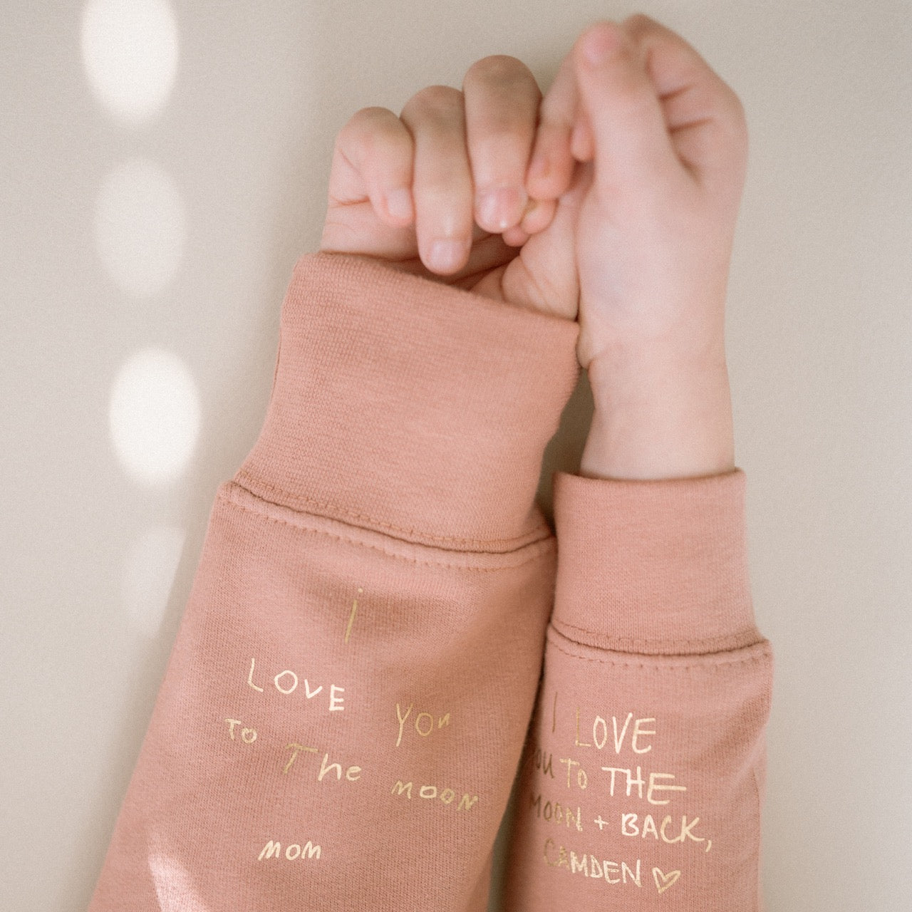 handwriting sleeve message sweater